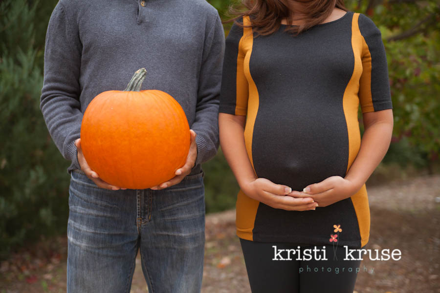 Maternity shot with pumpkin