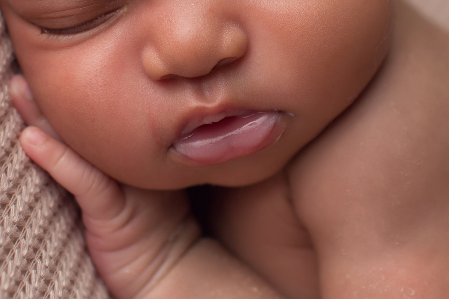 close up of newborn baby girl lips