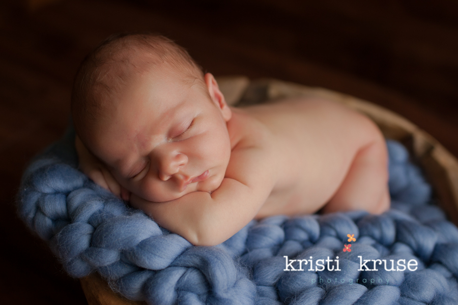 Raleigh newborn posing photographer